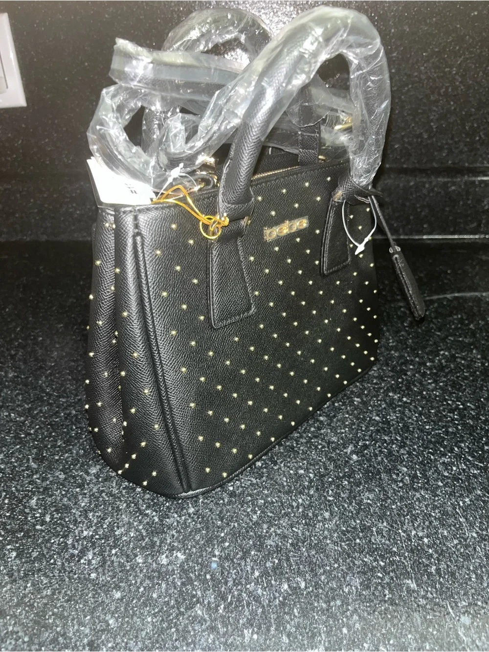 bebe Black Satchel with Gold Stud Detailing